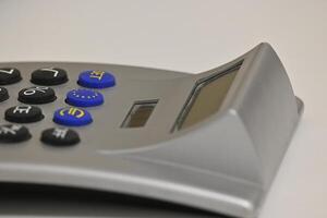 A gray solar calculator with the focus on the symbol of the European Union with stars in a ring photo