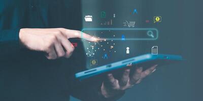 insight research ,Businessman searching for business information through virtual screen,Searching for information he is interested in through online websites,keyword search ideas to find references photo