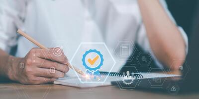ERP document system ,quality assessment management With a checklist ,online document database ,Auditor worker working with document folder ,Management of important document storage of organization photo