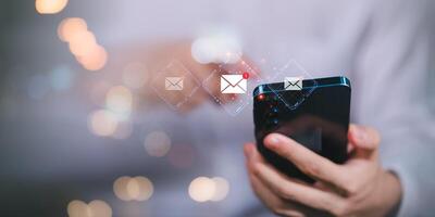 Digital communication with email messages,Sending and receiving messages online with the email icon ,notifications ,electronic mail and Security, Email marketing and newsletter concept photo
