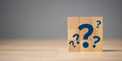 Finding new solutions to solve business problems ,FAQs ,Questioning concepts, why, where, when, how, who ,to find the answer , and ask for help to solve the problem photo