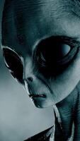 3D rendering. Portrait of Scary gray alien stands and looks blinking on a dark smoky background. UFO concept. video