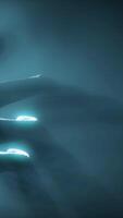 3D rendering. Close-up of an alien's hand in volumetric light. video