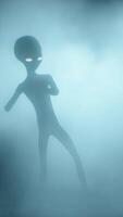 3D rendering. Scary gray alien dancing on a dark smoky background. UFO futuristic concept. video