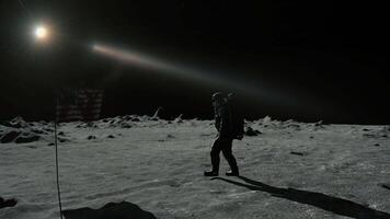 Astronaut walking on the moon saluting the American flag. 3D rendering animation. video