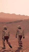 3d rendering. Astronaut wearing space suit walking on the surface of mars. Exploring mission to mars. Futuristic colonization concept. video