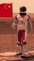3d render. Astronaut walking on Mars with Chinese flag. Exploring Mission To Mars Red Planet. Futuristic Colonization Space Exploration. video