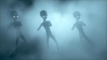 3D rendering. Scary gray aliens dancing on a smoky background. UFO futuristic concept. video