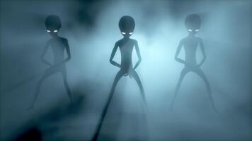 3D rendering animation. Scary gray aliens dancing on a dark smoky background. UFO concept. video