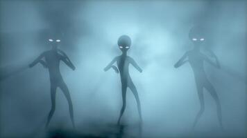 3D rendering. Gray aliens dancing on a dark smoky background. UFO futuristic concept. video