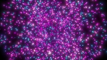 Animation background of particles emitting light, colorful dust, guiding lights. Mesmerizing bokeh effect. Colorful abstract background 4K, seamless loop. video