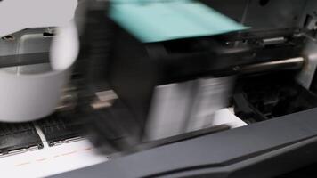 Close-up View of Inkjet Printer Print Heads Operating in Modern Office Environment with Paper video