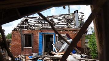 View to destroyed residential buildings at Kharkivska oblast. Ruined houses after bomb attacks on ukrainian territory from russia army. Consequences of russian invasion of Ukraine. Slow mot video