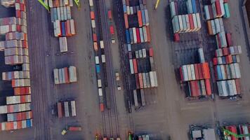 Aerial view from a rotating drone of the trucks at the terminal in the queue for unloading. video