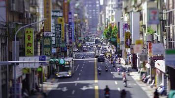 A timelapse of miniature traffic jam at the downtown street in Taipei panning video
