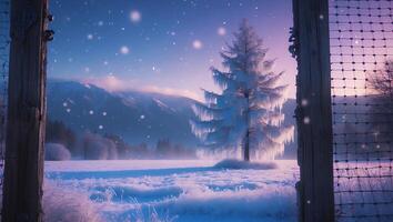 Snowy Tree Seen Through Fence Winter Landscape with Mountain Backdrop photo