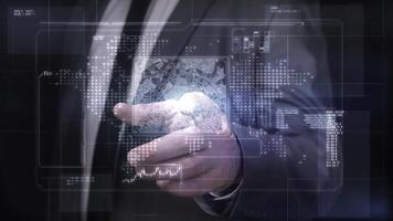 Businessman using futuristic interface showing city map and data analysis video