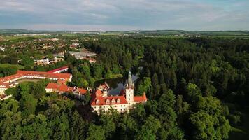 Aerial side view of Pruhonice chateau and park in May 2025 in Czechia video