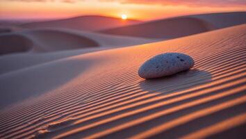 Desert Sand Dune with Rock at Sunset Golden Hour Scenery photo