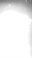 Bright abstract explosion in black and white with glowing energy shards and floating particles video