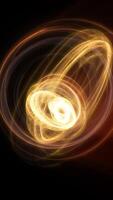 Golden swirling abstract form with a luminous vortex at the center, floating on a black background video
