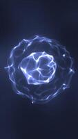 Organic glowing energy sphere formed from interconnected light filaments, floating in a dark atmosphere video