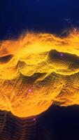 Abstract golden landscape of digital particles forming peaks and waves on a dark background, glowing and dynamic video