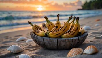 Bananas in Bowl on Beach at Sunset with Seashells photo