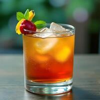 Refreshing cocktail garnished with cherry mint and lemon peel resting on a wooden table photo
