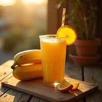 Enjoying Fresh Orange Juice with Bananas on a Wooden Table photo