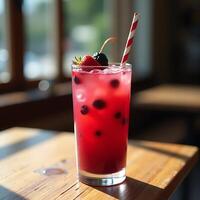 Refreshing Berry Drink with Ice and Straw on Wooden Table photo