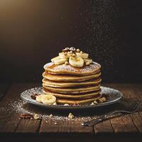 Serving Stack of Pancakes with Banana and Nuts on Plate photo