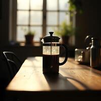 Brewing Coffee Using a Glass Press on a Wooden Table photo