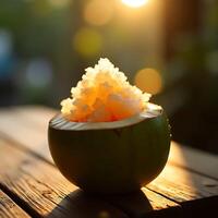 Eating Refreshing Ice Shave in Coconut Bowl at Golden Hour photo