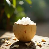 Serving Refreshing Ice Crystals in a Natural Bowl on Wood photo