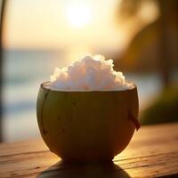 Coconut Filled with White Ice at Golden Hour Near Ocean photo