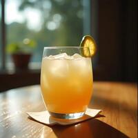 Iced Citrus Drink on Wooden Table with Lime Slice photo