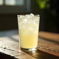 Iced Drink on Wooden Table Refreshing Summer Beverage photo