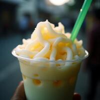 Enjoying Refreshing Fruit Shake with Topping and Straw photo