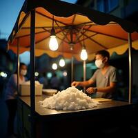 Serving Shaved Ice at Night Market with Protective Masks photo