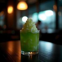 Refreshing Green Drink with Whipped Topping on Table photo