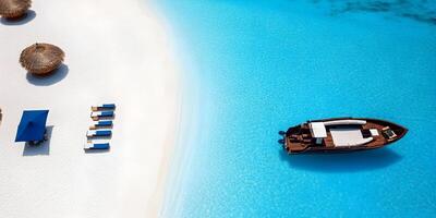 Luxury Boat on Tropical Beach with Cabanas and Lounge Chairs photo