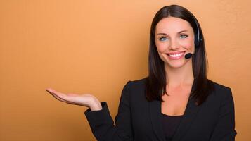 Smiling Customer Service Representative Wearing Headset Presenting Product Orange Background photo