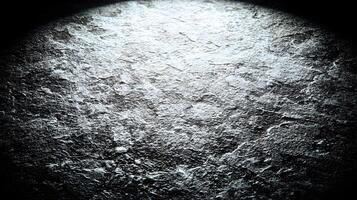 Dark Gray Textured Surface Illuminated Spotlight Grunge Background photo