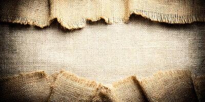 Beige Burlap Texture Background with Frayed Edges Rustic Canvas Fabric Design Element photo