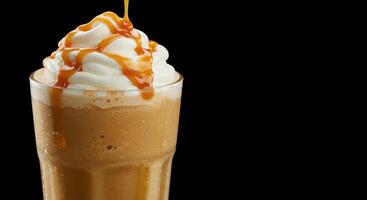 A refreshing cold caramel coffee drink, topped with whipped cream and caramel drizzle. photo