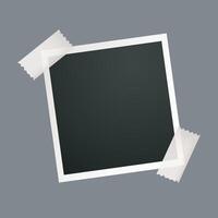 blank photo frame with tape in isolated background vector