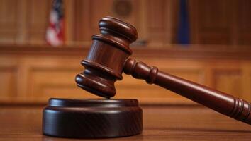 Realistic courtroom scene with dramatic lighting and gavel photo