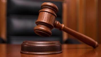 Final moment of justice captured with a wooden gavel impact photo