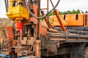 Drilling rig for pile installation and soil sampling. Heavy geotechnical equipment used for subsurface investigation and foundation works. High quality photo